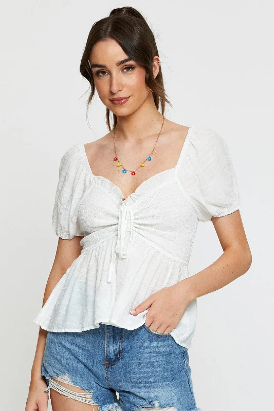 women's tops for those who love to experiment with fashionWhite Peplum Top Short Sleeve